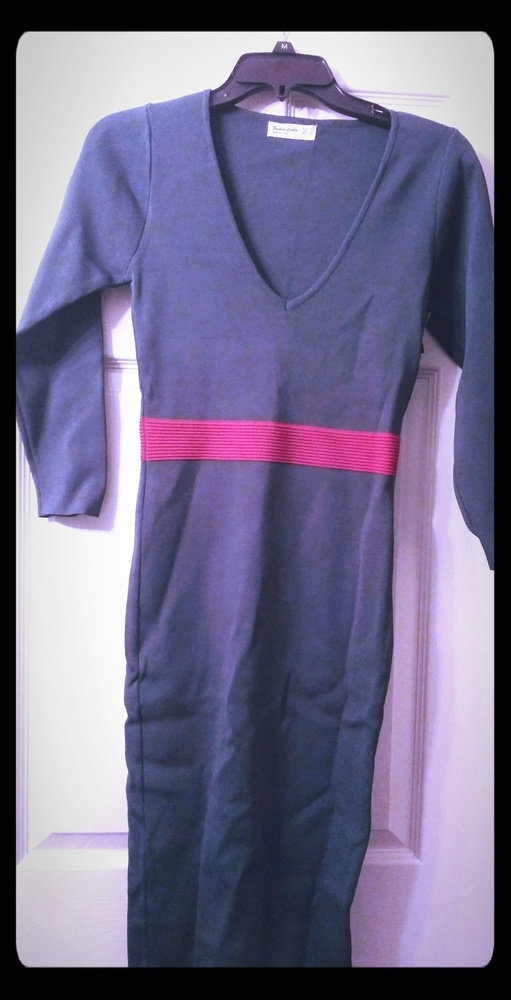 Green dress with red stripe, low cut v necj